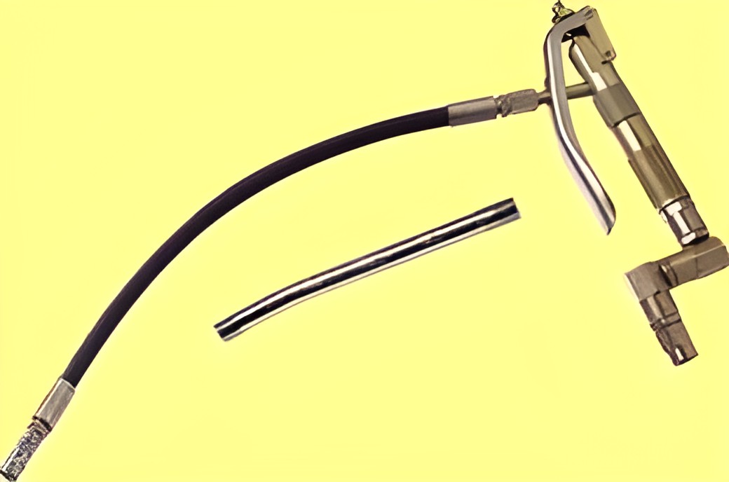 Gun with flexible/rigid delivery tube